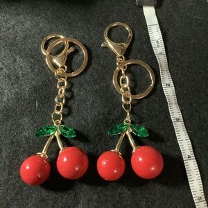 Cherries w/green bling leaves Bag Charms